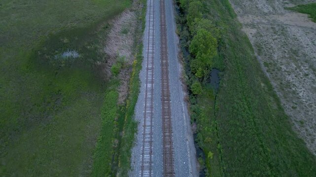 4K Drone Flyover of Railroad Tracks Through Farmland in Smithville, Ontario