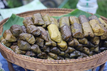 Khao Tom, Traditional Lao snack making on Buddhist day
