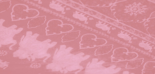 Blur, a soft pink fabric with intricate white elephant motifs gracefully swirling in folds, creating a textured appearance and a luxurious aesthetic.