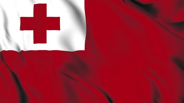 The Tonga flag waves in the wind.