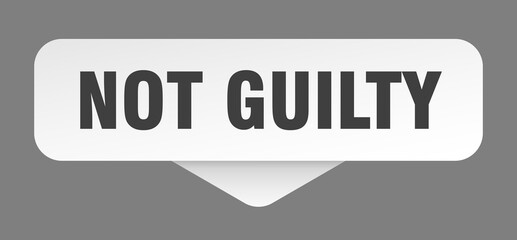 not guilty sticker. not guilty sign isolated on gray background