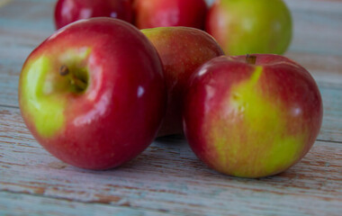 Close-up of juicy apples isolated on a light background – healthy eating and autumn fruits