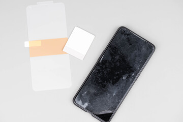 Broken Smartphone with Replacement Screen – Mobile Phone Repair Concept