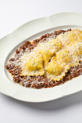 Portion of gourmet italian ravioli dumplings with minced beef