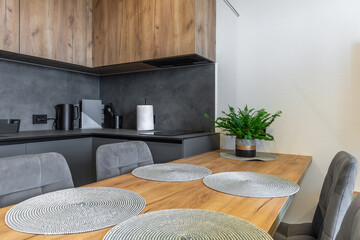 Modern Kitchen Interior with Wooden Dining Table