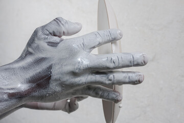 strong active hands working with pottery during the glazing process textured 