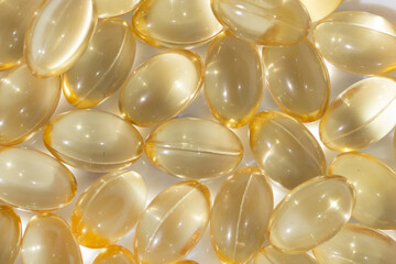 Yellow Gel Vitamin Capsules Macro Background
