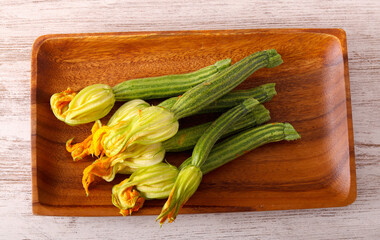 Raw mini zucchini with flowers