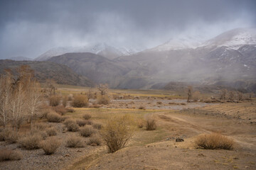 Gravel road through deserted valley leading from Mars Altai Russia. Remote pathway to famous...
