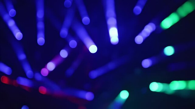 Dynamic bokeh lights illuminate the scene with vibrant colors and movement