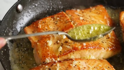 Garlic butter salmon seared to perfection, rich in flavor with herbs and lemon — a gourmet seafood dish ideal for fine dining visuals, culinary shoots, luxury meals, and restaurant foods.