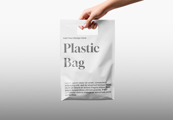 Hand Holding Plastic Bag Mockup