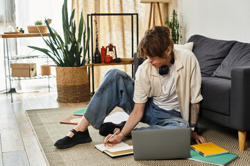 Focused young student engages in study session at home surrounded by vibrant decor