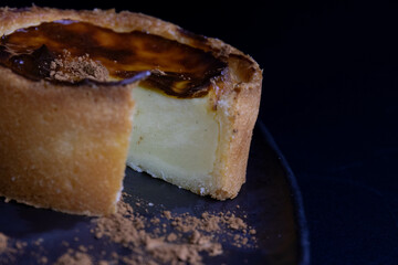 A rich, round baked French custard tart , Flan