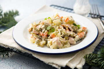 Traditional Russian salad with ham