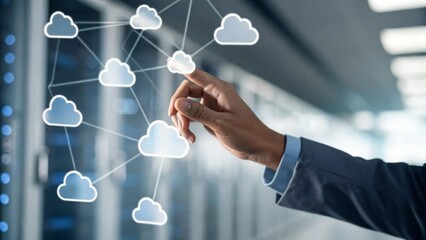 A hand interacting with digital cloud icons in a tech environment.