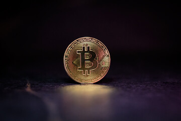 Bitcoin with Golden Glow Reflected on Surface