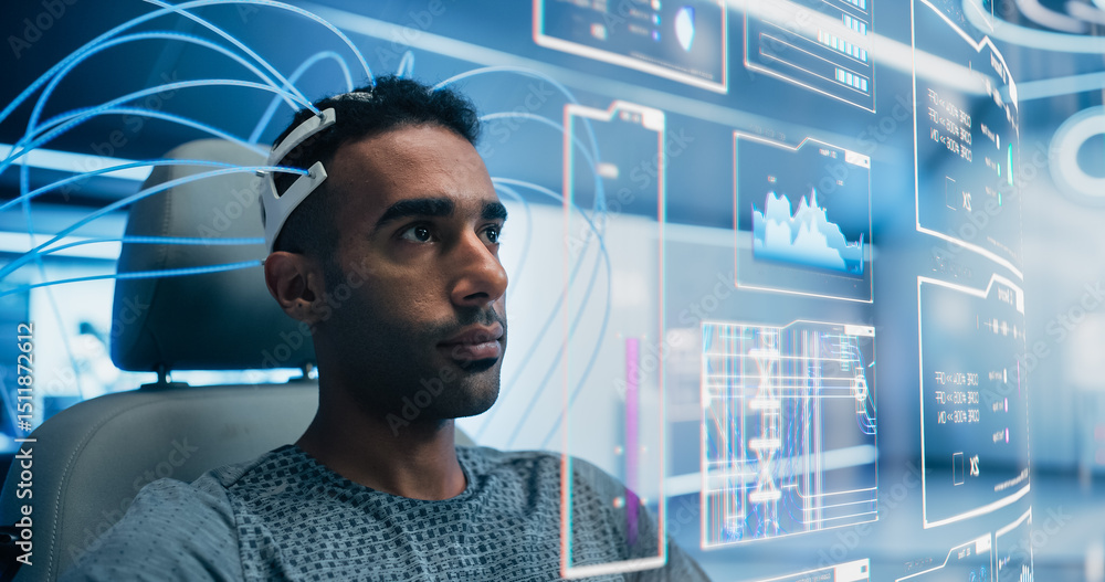 Leinwandbilder Man Wearing a Neural Headset Sits in a Futuristic Lab, Controls Holographic Interface, Internet Visuals Graphs and Statistics. High-tech, Advanced Technology and Immersive Experiences of the Future