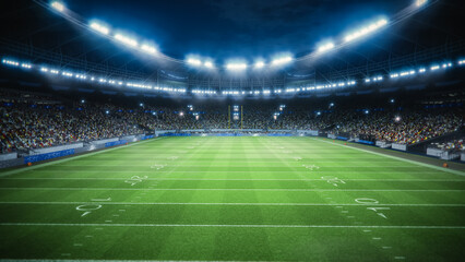 Night Aerial Elevated View of an American Football Stadium With Enthusiastic Fans. Field of a Major...