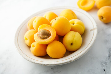 Fresh apricots in a bowl