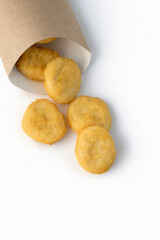 Fast food: nuggets in packaging on a white background. Serving for a bar, menu.