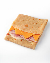 Fast food: pancake with ham, cheese and cheese sauce on white background. Serving for bar, menu.