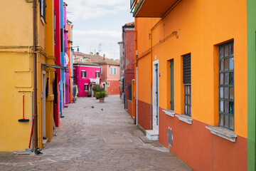 Fototapeta premium Explore the vibrant colors and charming streets of Burano in Venice