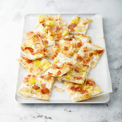 Tarte flambee with ham and leek