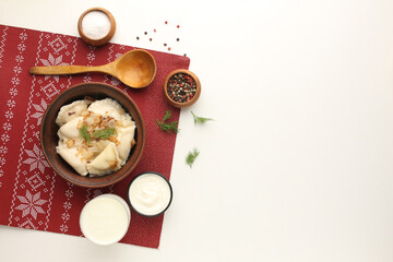 Traditional Ukrian food dumplings and sour cream