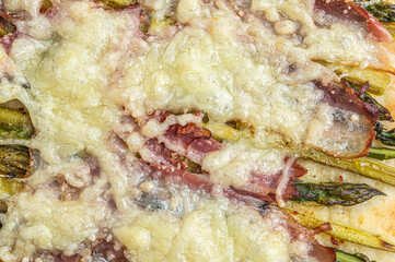texture of a snack with asparagus and parmesan close-up