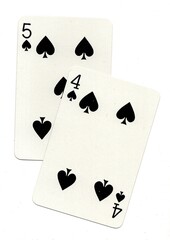 A pair of playing cards in the suit of spades isolated on a white background.