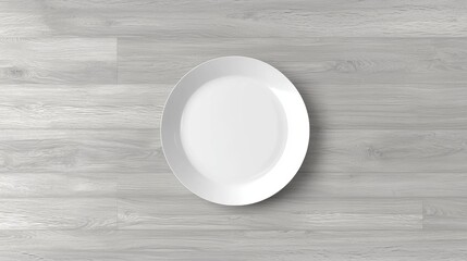 A white plate on a wooden floor.