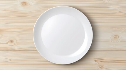 An empty white plate on a wooden table.