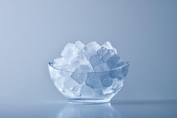 Bowl with ice cubes backlit with isolated background