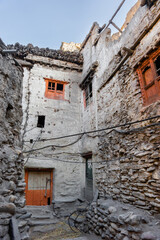 Old tradition tibetan houses with beautiful colorful wooden windows in Kagbeni village. Mustang,...