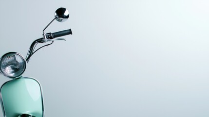 A light blue scooter with chrome handlebars and a round headlight.