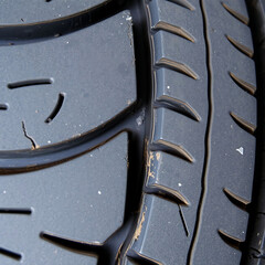 Weathered Tire Tread – Faded Rubber Surface with Dust and Cracks, Ultra Close-Up