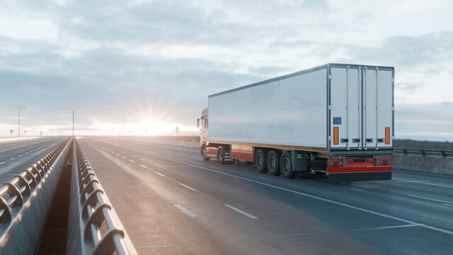 Red Cargo Truck Driving on Wet Highway at Sunrise &ndash; Freight Transport&nbsp;Concept
