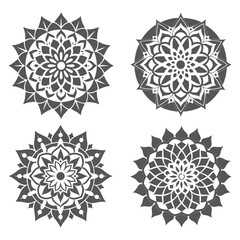 Collection of Four Intricate Mandala Designs in Gray, Perfect for Decorative Elements and Artistic Projects, Showcasing Symmetry and Ornamental Style.