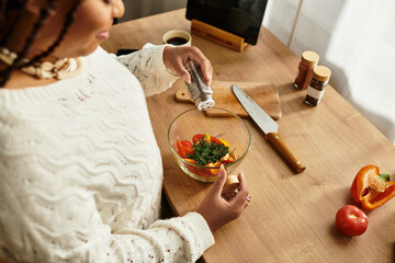 Joyful moments in the kitchen while preparing a fresh salad at home