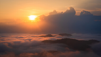 The beautiful natural landscape is a sea of mist in the morning, the movement of the fog covering the Mountain—tourism to enjoy the natural beauty of Mae Chaem, Chiang Mai, Northern Thailand.