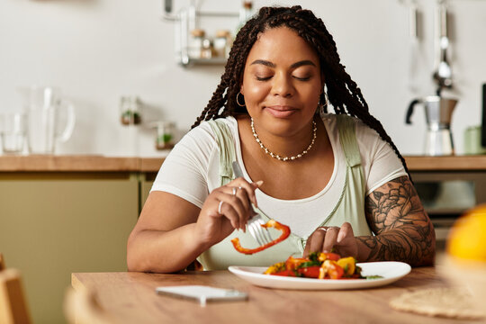 Enjoying a vibrant salad at home during a relaxing lunch break