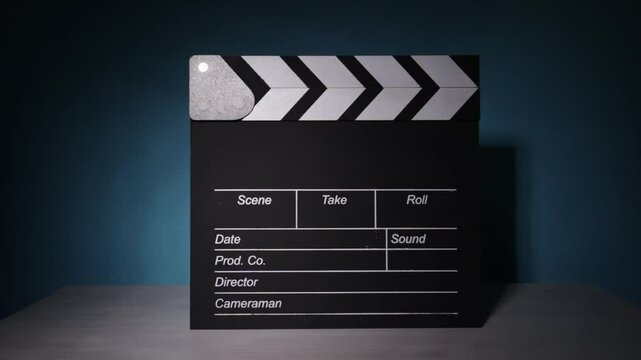 cinema production, clapperboard glow, beam reflection, Hollywood movie setup, action preparation, storytelling medium, filmmaking essentials, editor&rsquo;s cut, movie reel, feature film process