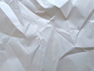 Crumpled light paper. Paper background. Texture paper background. Clean crumpled paper
