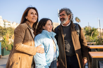 Happy family enjoying sightseeing in city center
