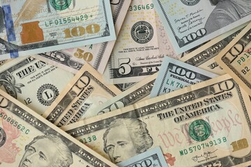 Stack of dollar bills. Hundred, fifty, twenty, ten, five dollars banknote close up