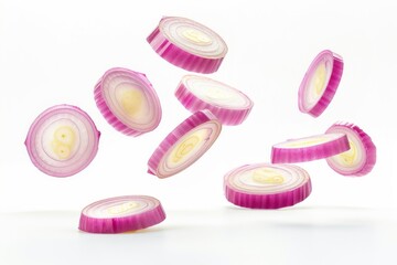 Obraz premium Floating red onion slices isolated