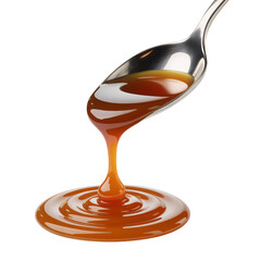 Caramel sauce dripping from spoon isolated on transparent background, sweet dessert topping closeup.