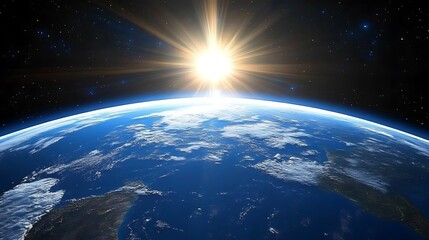 Obraz premium A brilliant sun shines above the blue planet Earth in space