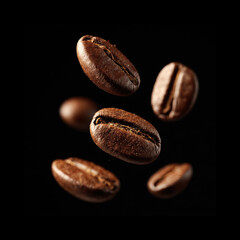 Fototapeta premium Coffee beans floating in a dark background
